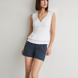 NWOT BCBG white peplum top